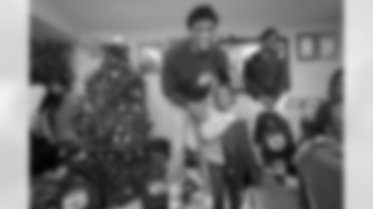 New Orleans Saints wide receiver Michael Thomas held a gift-giving event for dozens of kids from the Youth Group at the Holy Faith Temple Church in Treme on December 20, 2022.