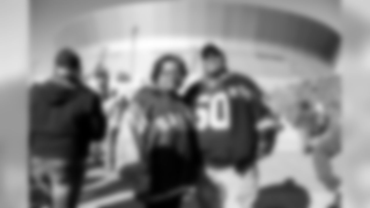 New Orleans Saints fans get ready for the Wild Card playoff game against the Minnesota Vikings during our pregame party at Champions Square.