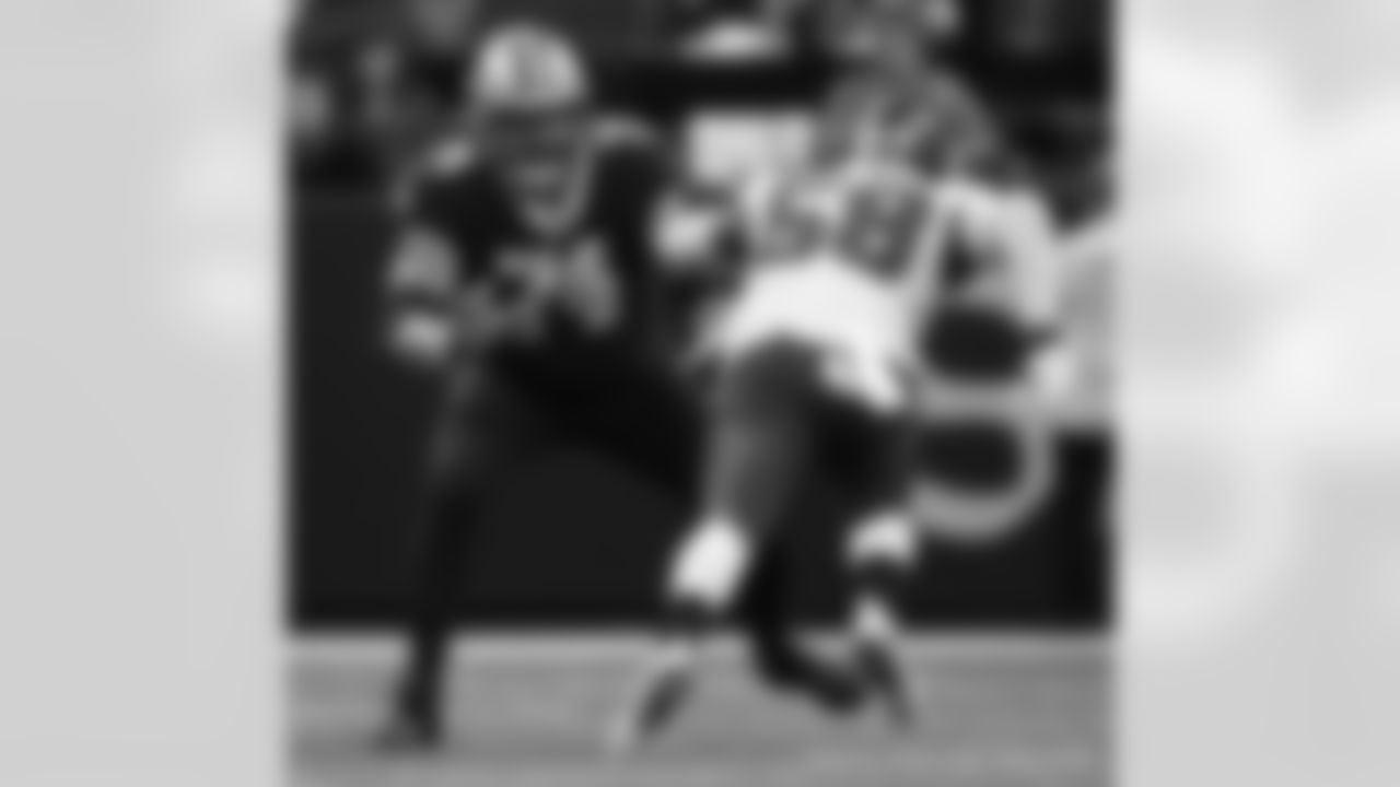 New Orleans Saints offensive lineman James Hurst (74) in action during their 2022 Week 2 game against the Tampa Bay Buccaneers.