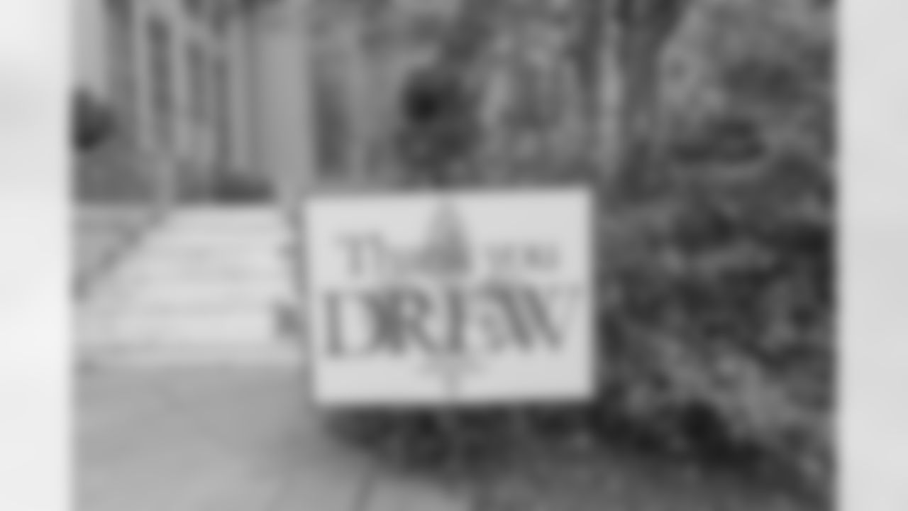 Following the announcement of Drew Brees' retirement from the NFL, New Orleans Saints fans and local businesses around the city paid tribute to legendary quarterback with yard decorations.