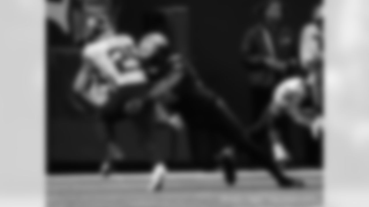 New Orleans Saints players in action during their 2022 Week 15 game against the Atlanta Falcons.