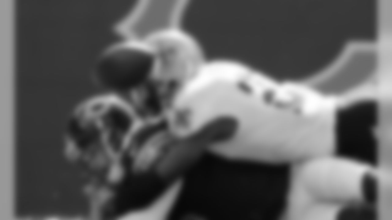 Photos of safety Malcolm Jenkins during his first stint with the New Orleans Saints and his time with the Philadelphia Eagles.