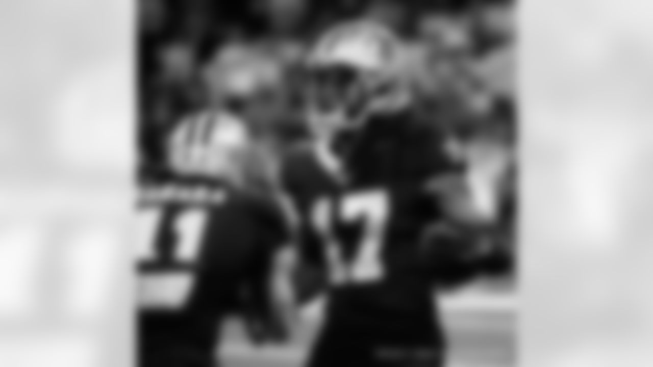 New Orleans Saints players in action during their 2022 Week 9 game against the Baltimore Ravens.