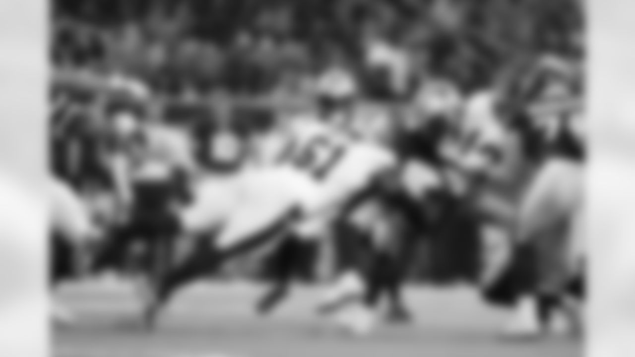 New Orleans Saints defensive end T.J. Carter in action during the 2022 Preseason Week 1 game against the Houston Texans.