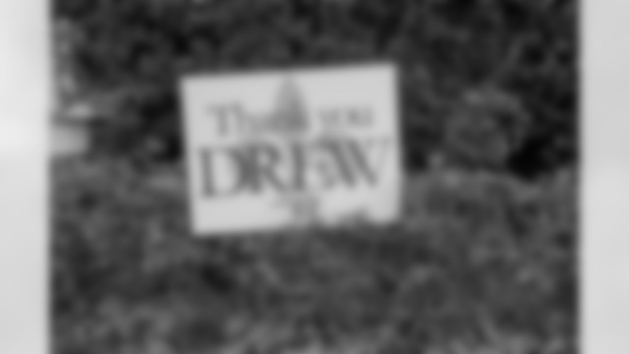 Following the announcement of Drew Brees' retirement from the NFL, New Orleans Saints fans and local businesses around the city paid tribute to legendary quarterback with yard decorations.
