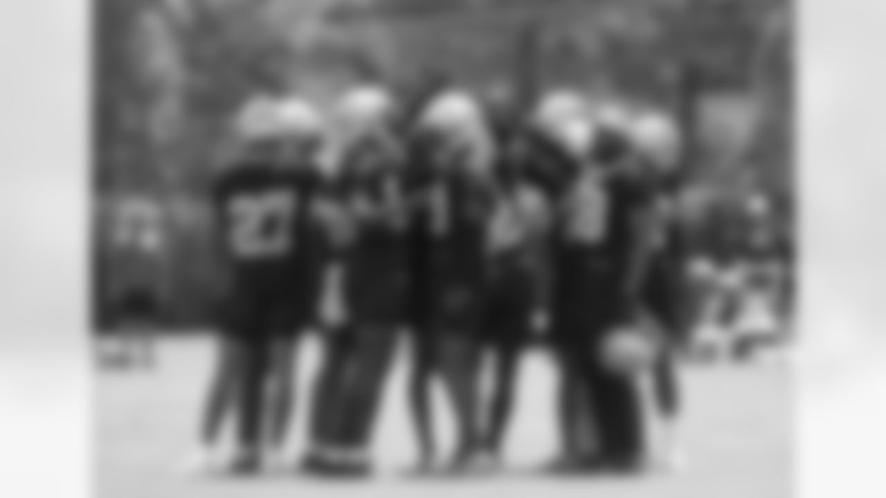 New Orleans Saints players huddle up during the team's 2022 OTA practices on May 26, 2022 at the Ochsner Sports Performance Center.