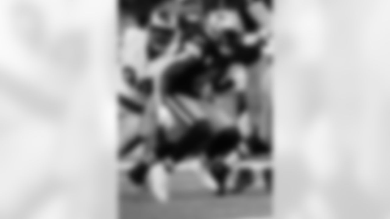 New Orleans Saints players in action during their 2022 Week 11 game against the Los Angeles Rams.