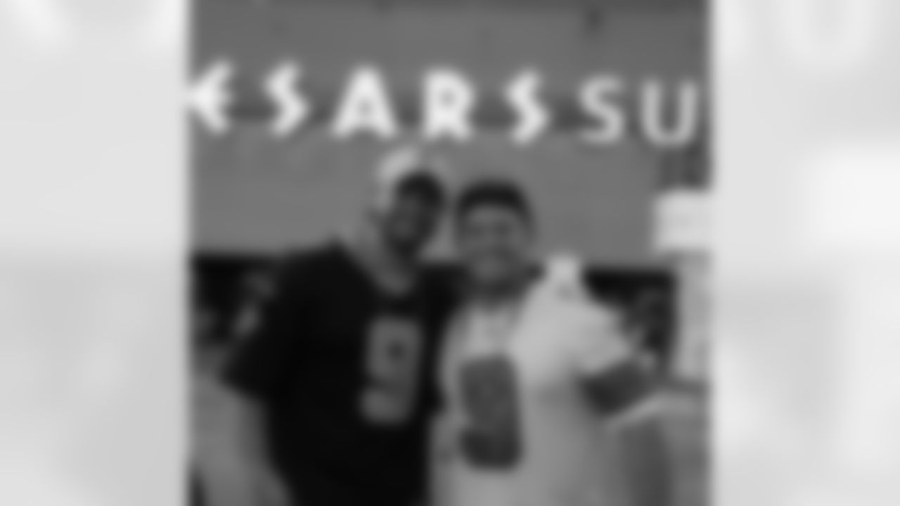 Saints fans get ready at Champions Square as the New Orleans Saints take on the Dallas Cowboys in Week 13 on December 2, 2021 at the Caesars Superdome.
