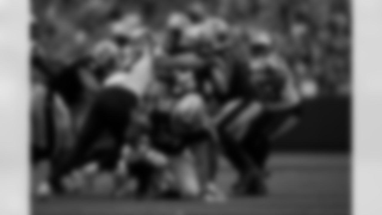 New Orleans Saints players in action during their 2022 Week 3 game against the Carolina Panthers.