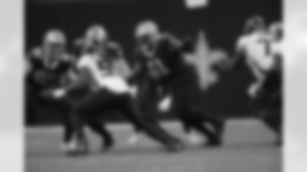 Check out photos of the New Orleans Saints offensive linemen in action during the 2021 NFL season.
