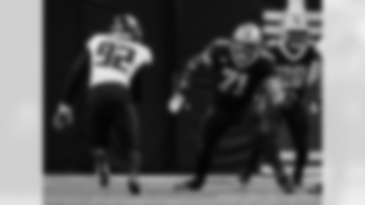 New Orleans Saints players in action during their 2022 Week 15 game against the Atlanta Falcons.