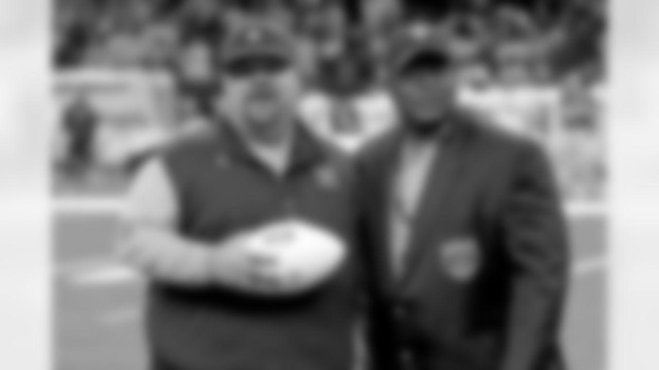 Saints legend Tyrone Hughes presented game balls to Westgate Tigers head coach Ryan Antoine and Warren Easton Fighting Eagles head coach Jerry Phillips before the Class 4A State Championship game on Friday, December 10, 2021. Hughes and Saints staff also presented game balls during Saturday's championship games at the Caesar's Superdome.