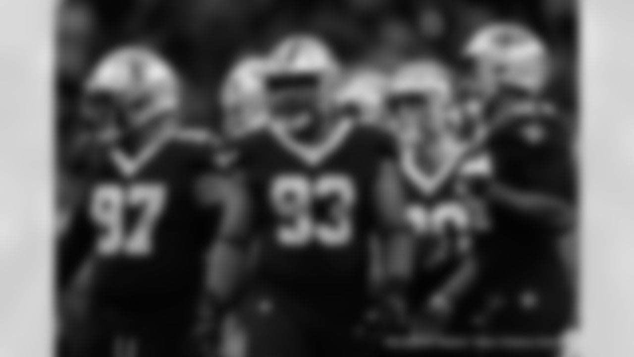 New Orleans Saints players in action during their 2022 Week 9 game against the Baltimore Ravens.