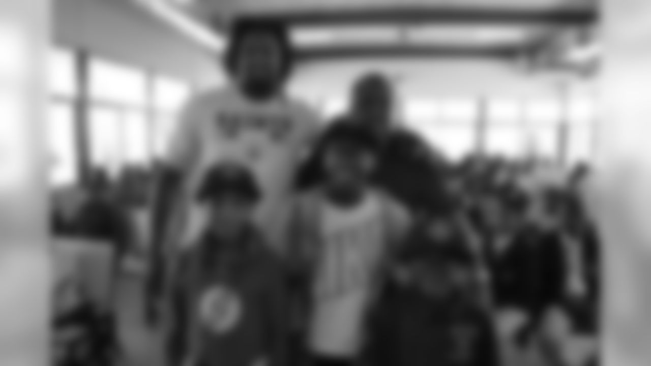 Cam Jordan visits Smothers Academy to talk about the importance of reading.