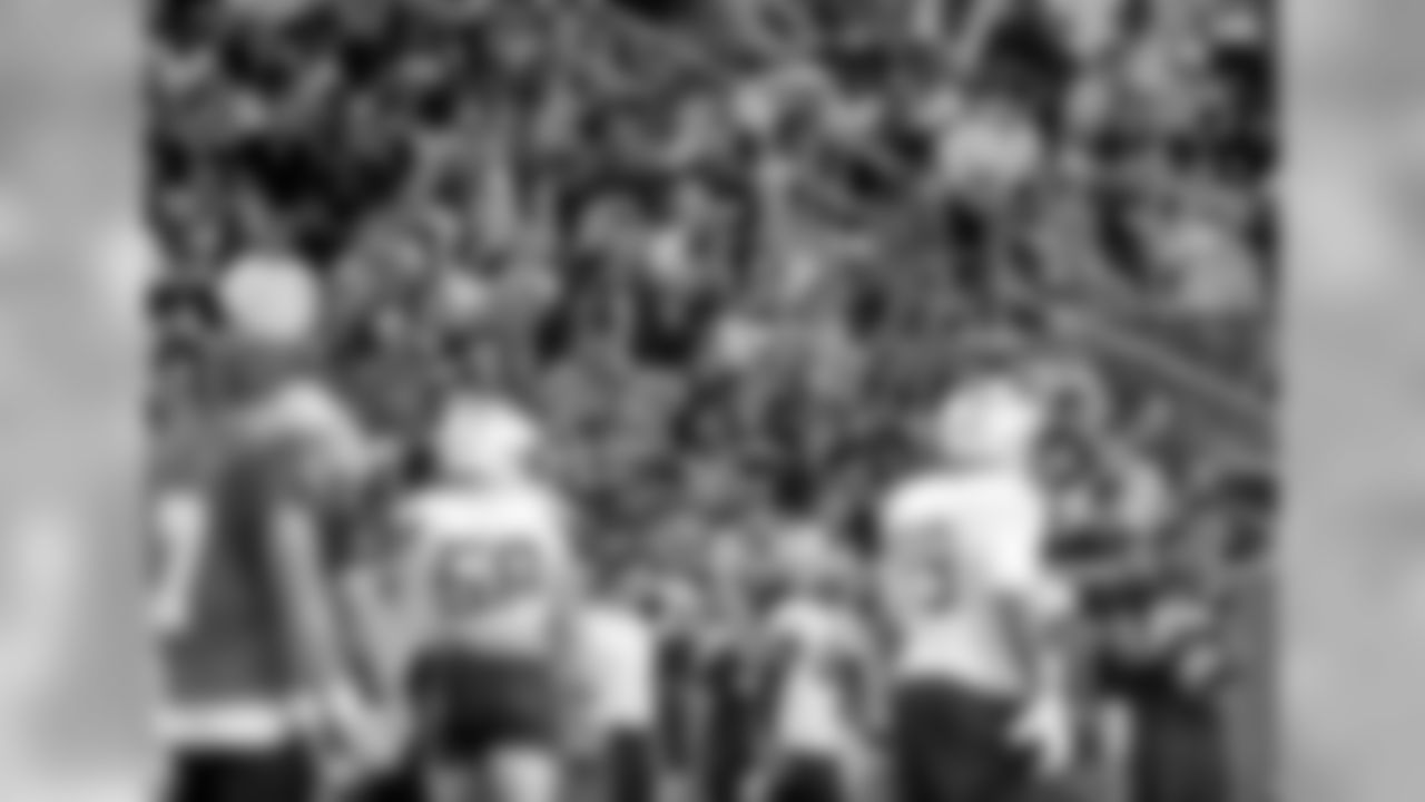 The crowd watches the action as the New Orleans Saints hold a 2019 training camp practice at Tulane University's Yulman Stadium on Sunday evening, August 4, 2019.