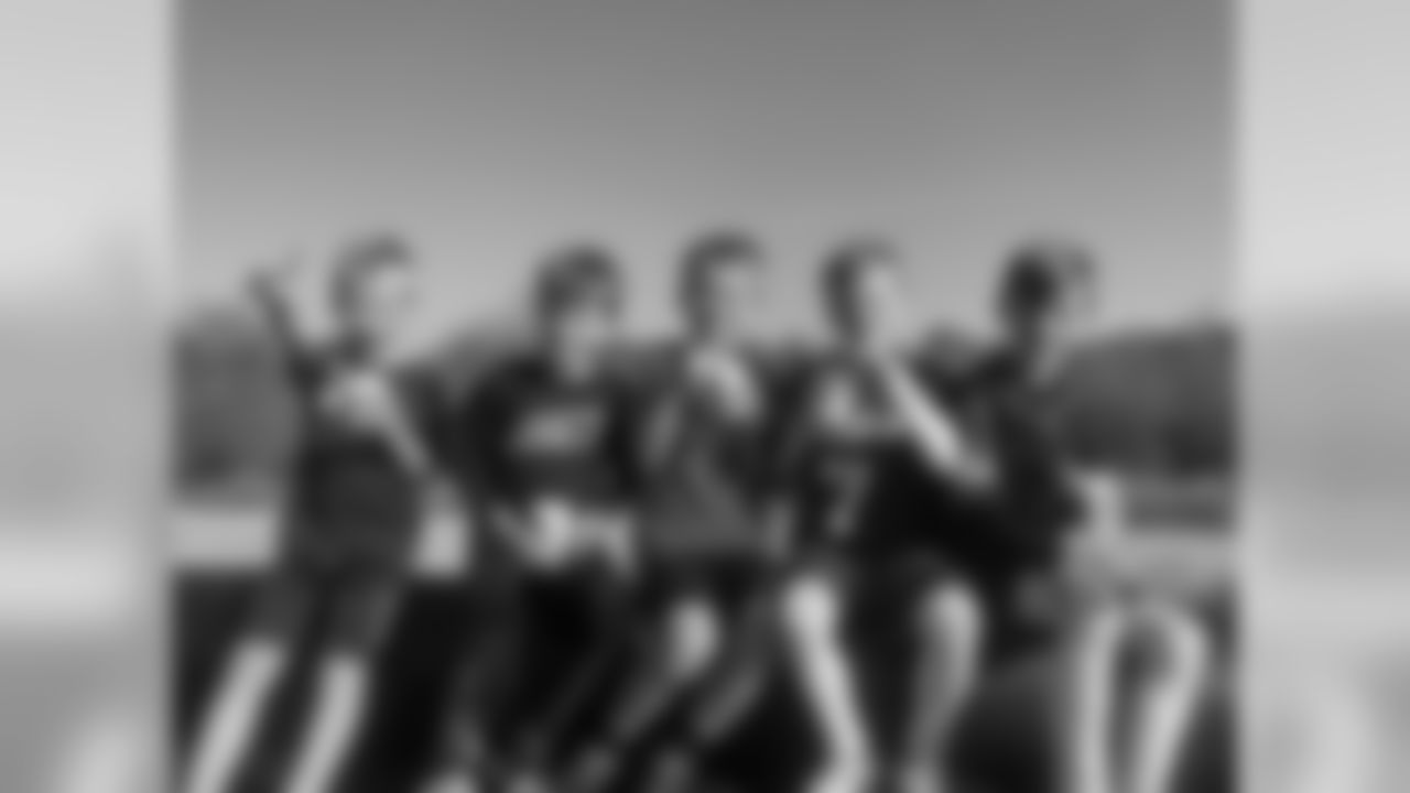 Drew Brees: Don't you love the number of pictures you have to take to get the right one. Ha! Finally they are all looking! Brees boys w their cousins.