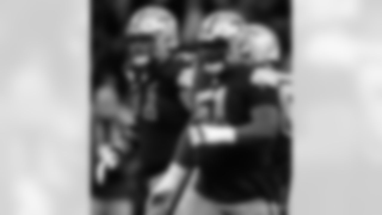 New Orleans Saints players in action during their 2022 Week 11 game against the Los Angeles Rams.