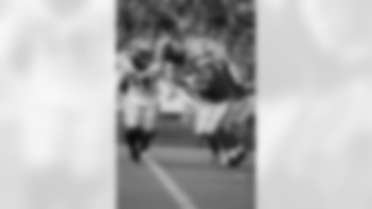 New Orleans Saints defensive end Taco Charlton (54) in action during their 2022 Preseason Week 2 game against the Green Bay Packers.