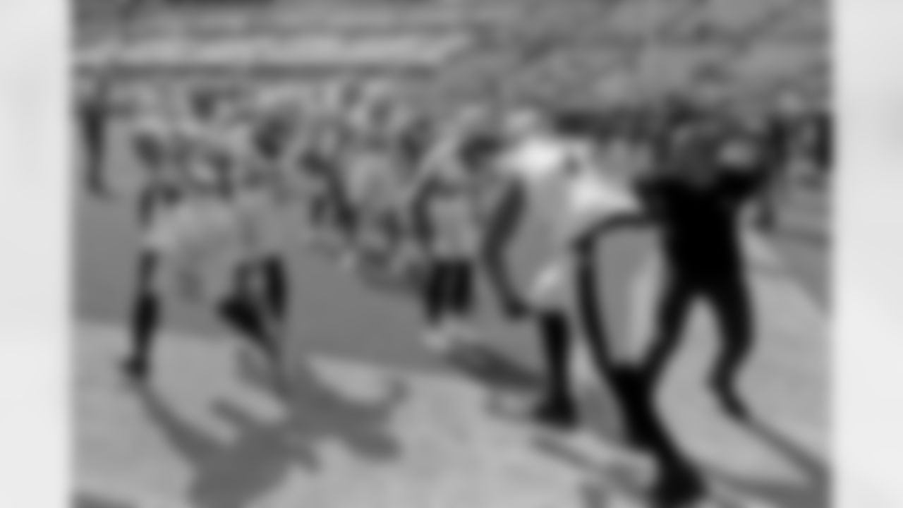 The New Orleans Saints prepare to take on the Green Bay Packers during pregame warmups at TIAA Bank Field in week 1 of the 2021 NFL season on Sunday, September 12, 2021.