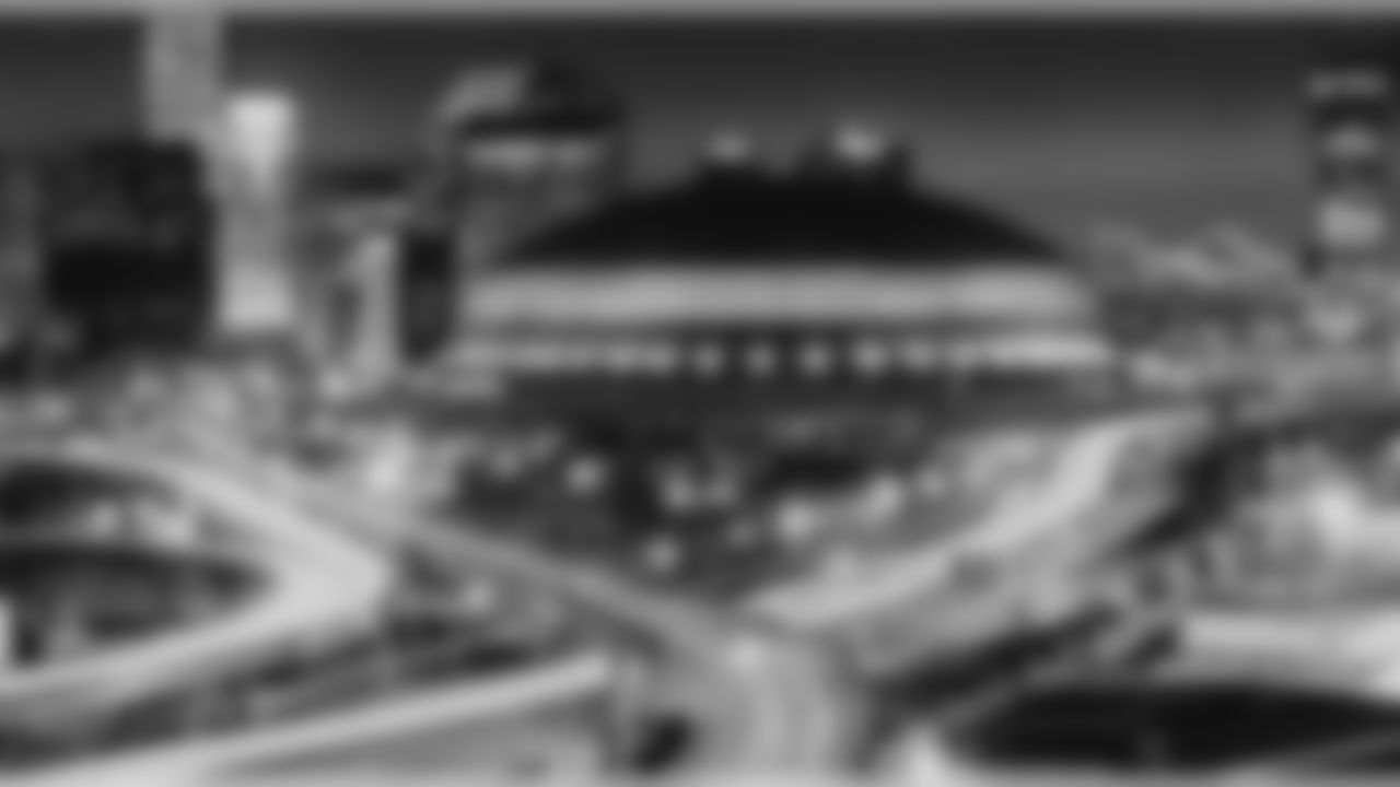 Late afternoon traffic passes the Louisiana Superdome in New Orleans Monday Dec. 30, 1996. The Superdome hosts Super Bowl on Jan. 26. (AP Photo/Dave Martin)