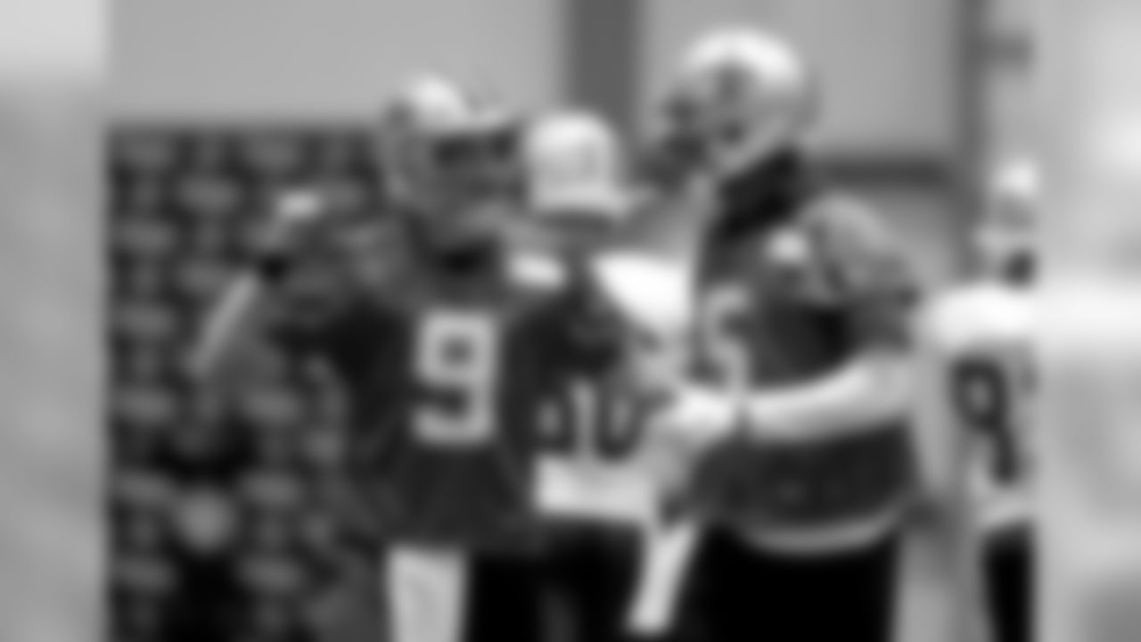 New Orleans Saints quarterbacks Drew Brees (9) and Teddy Bridgewater (5) confer during training camp practice at the team's headquarters in Metairie on Monday, August 19, 2019.