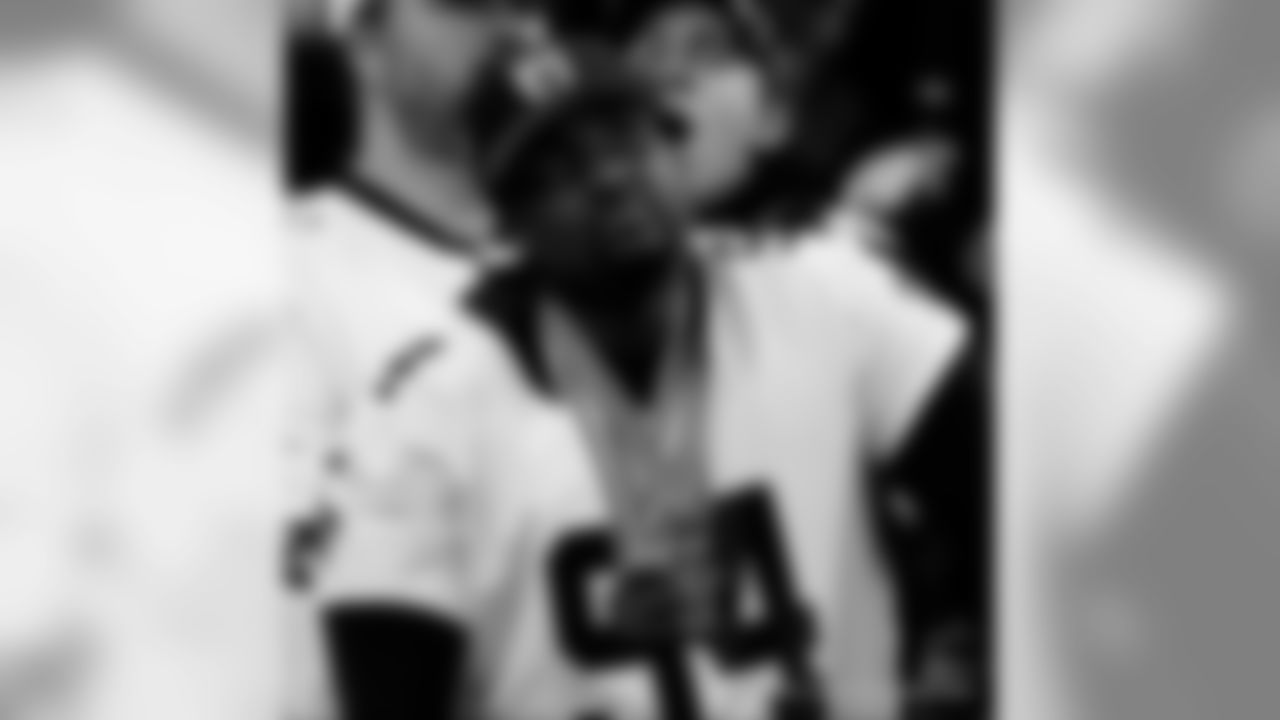 New Orleans Saints fans cheer on the team against the Minnesota Vikings at the Mercedes-Benz Superdome.