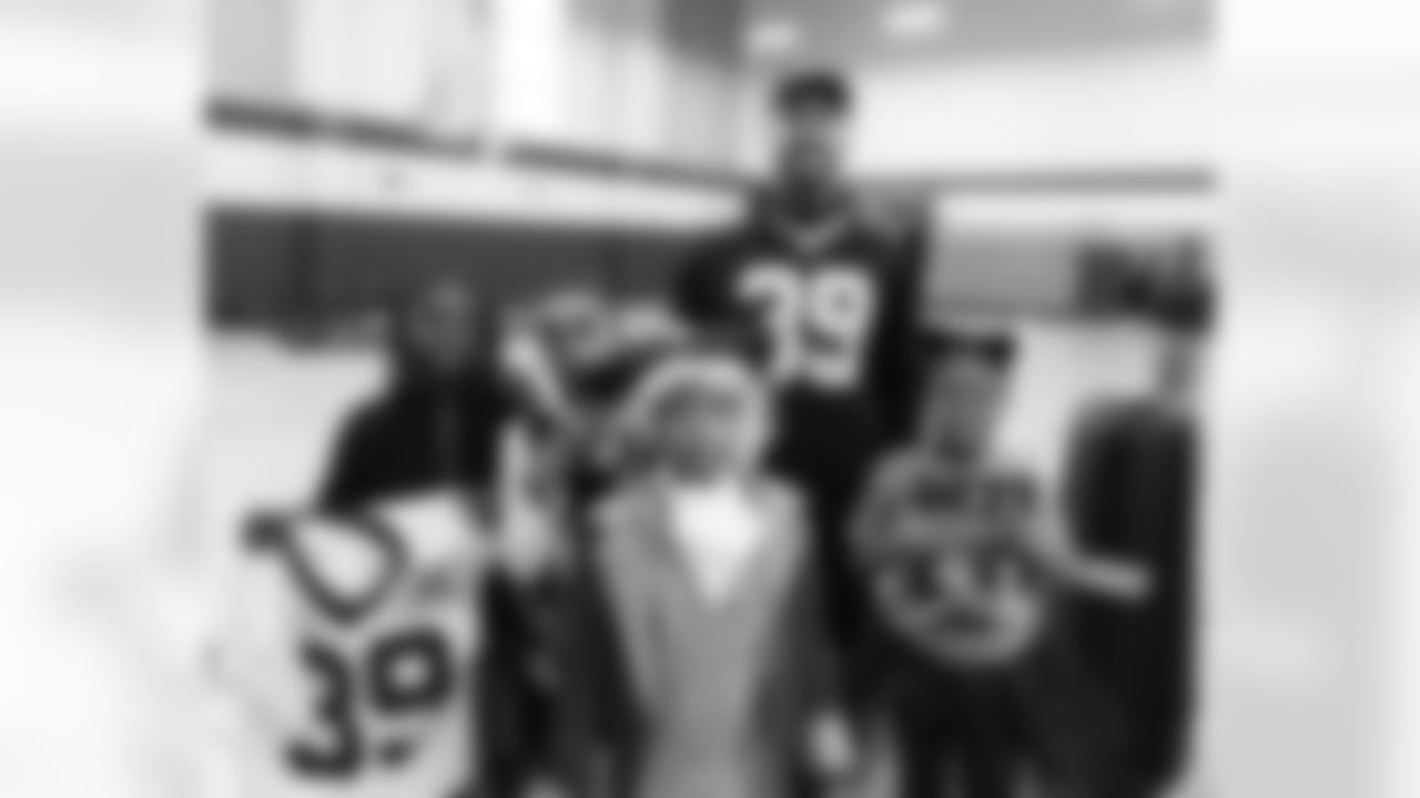 Saints punter Lou Hedley visited Edward Hynes Charter School - Parkview to run through football drills and visit with the students on Oct. 31. He was joined by Saints Legend James Allen (2002-2005) who is a physical education teacher at the school.
