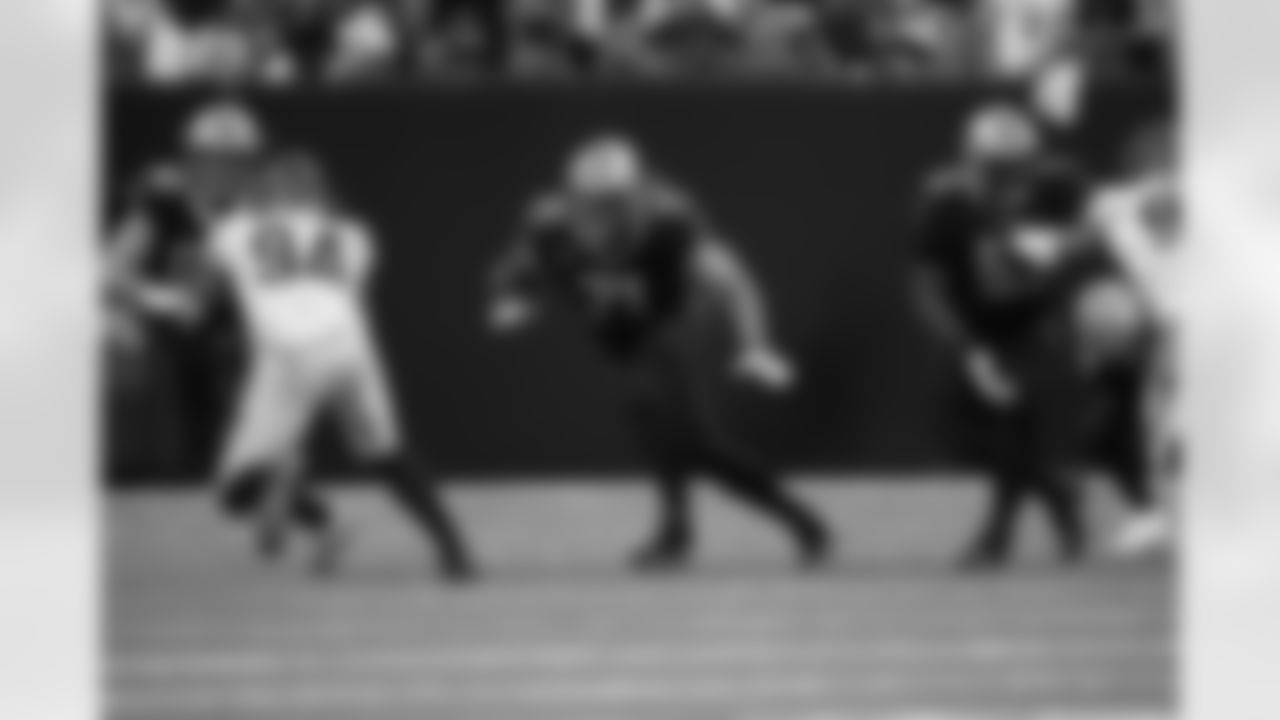 Check out photos of New Orleans Saints offensive tackles James Hurst, Ryan Ramczyk, Trevor Penning, and Landon Young in action throughout the 2022 season.