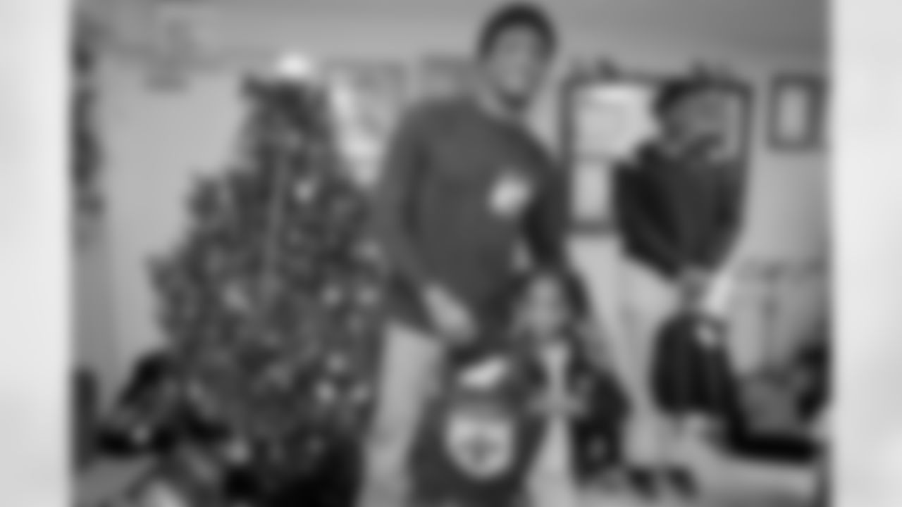 New Orleans Saints wide receiver Michael Thomas held a gift-giving event for dozens of kids from the Youth Group at the Holy Faith Temple Church in Treme on December 20, 2022.