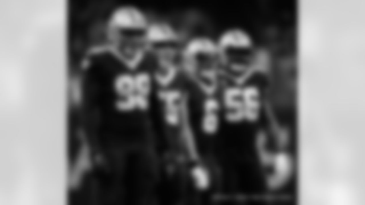 New Orleans Saints players in action during their 2022 Week 9 game against the Baltimore Ravens.