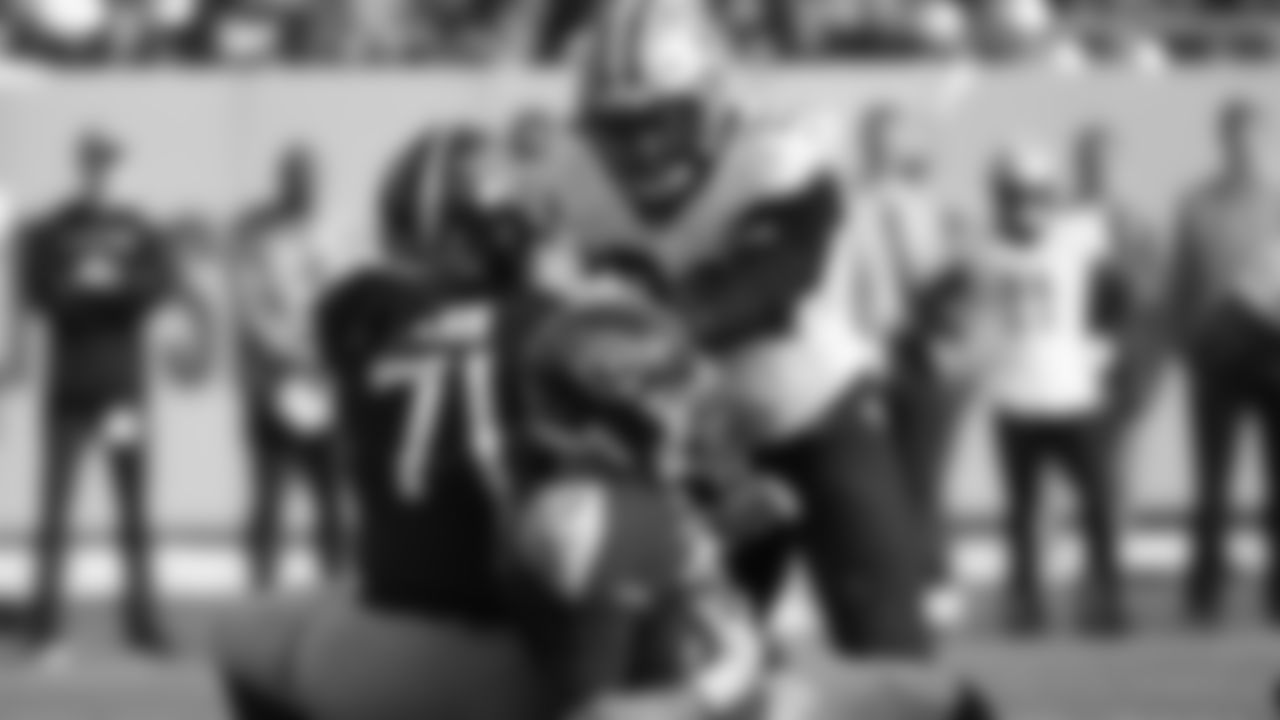 Check out photos of New Orleans Saints defensive end Marcus Davenport in action during the 2021 NFL season.