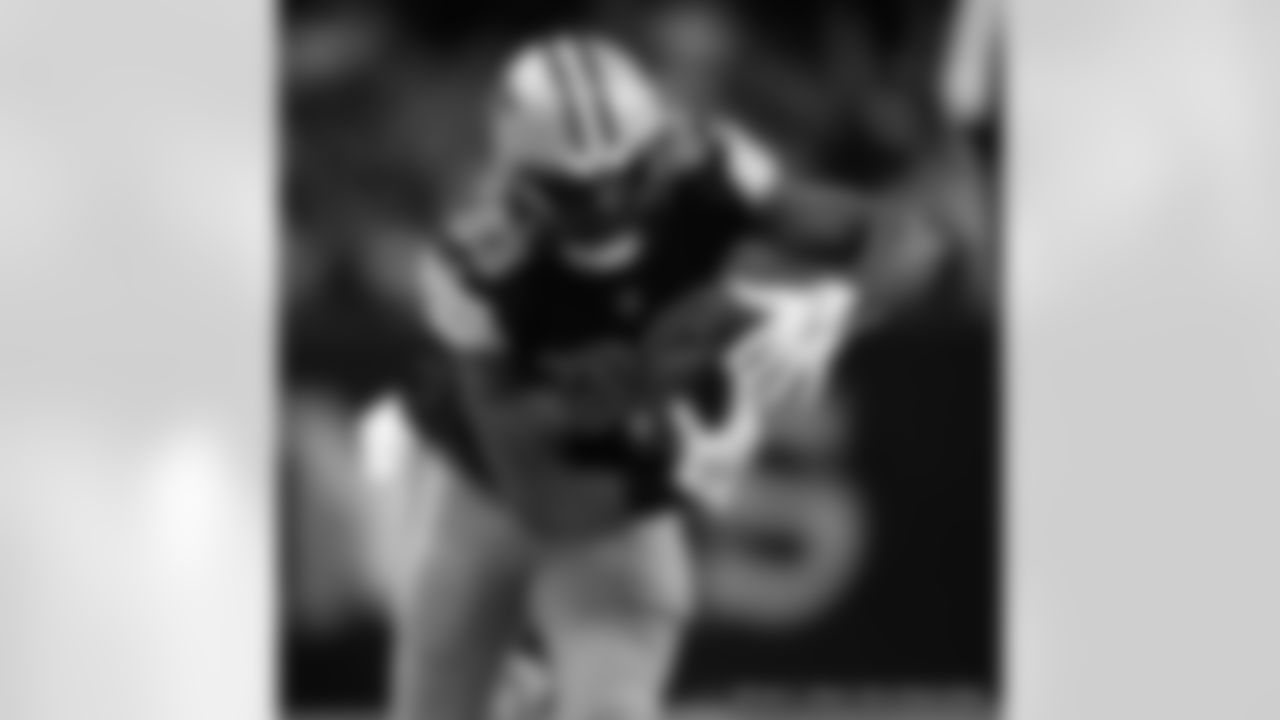 New Orleans Saints players in action during their 2022 Week 11 game against the Los Angeles Rams.