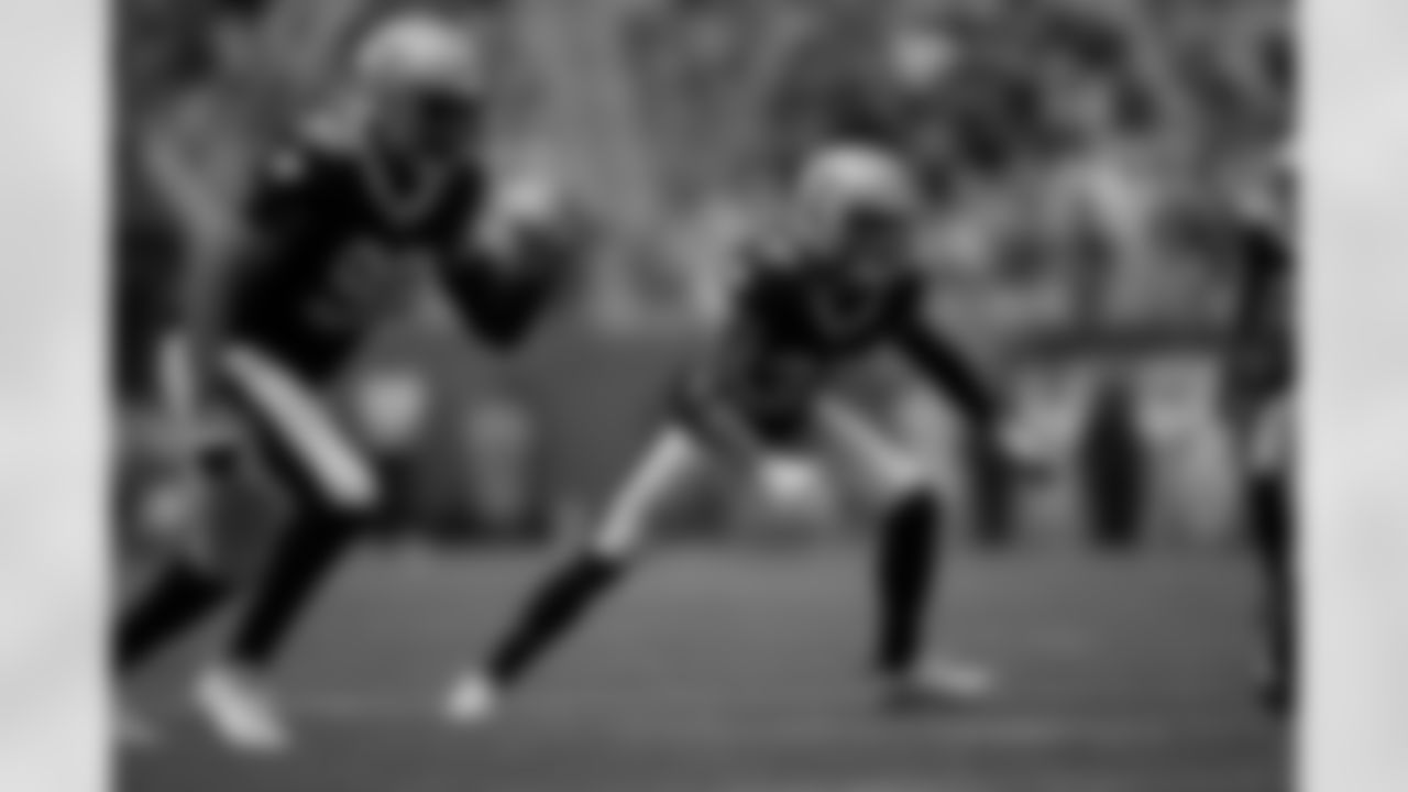 New Orleans Saints defensive end Marcus Davenport and safety Tyrann Mathieu in action during their 2022 Week 3 game against the Carolina Panthers.