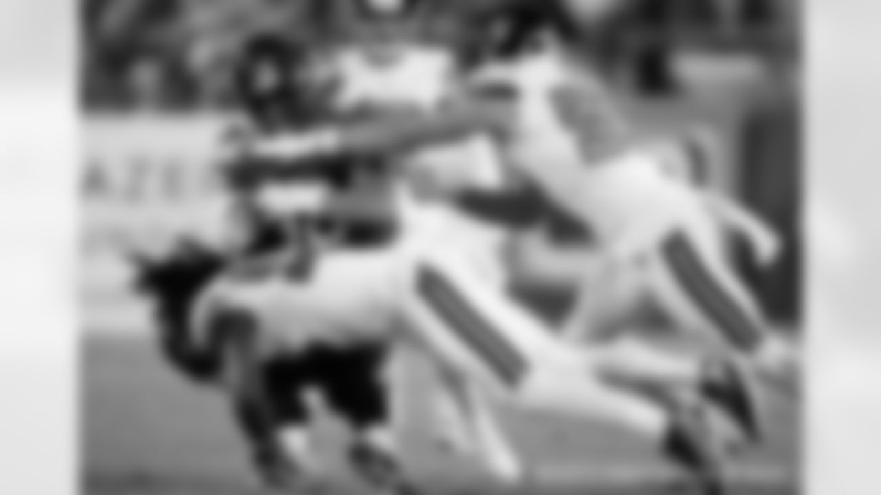 New Orleans Saints players in action during their 2022 Week 13 game against the Tampa Bay Buccaneers.