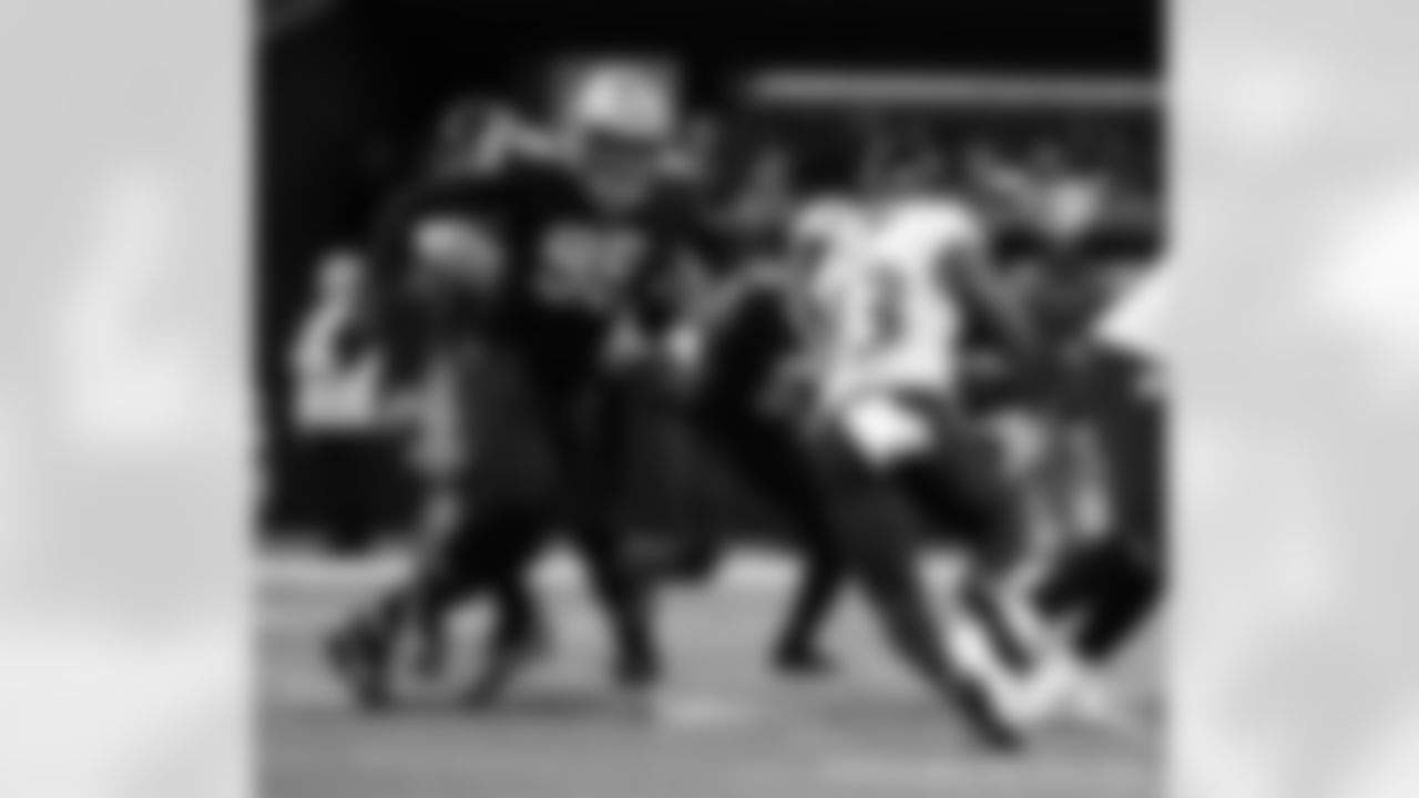New Orleans Saints players in action during their 2022 Week 9 game against the Baltimore Ravens.