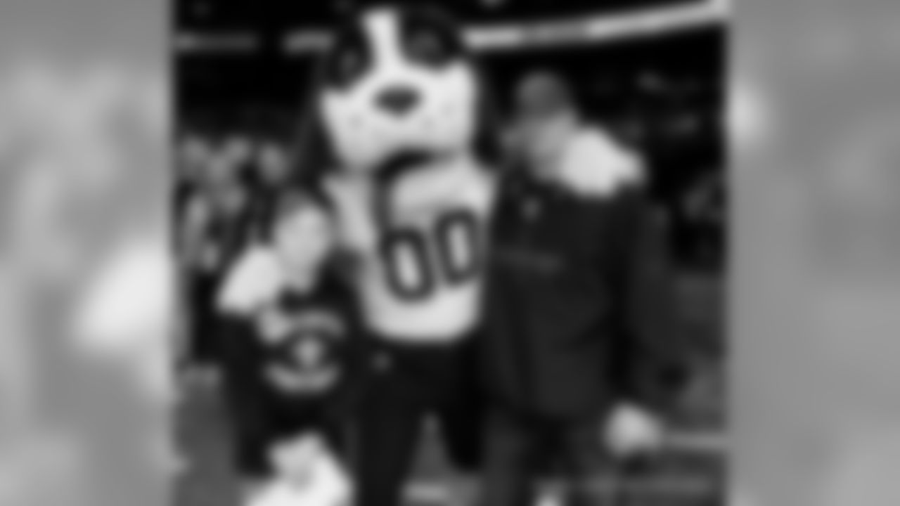 New Orleans Saints fans cheer on the team against the Minnesota Vikings at the Mercedes-Benz Superdome.
