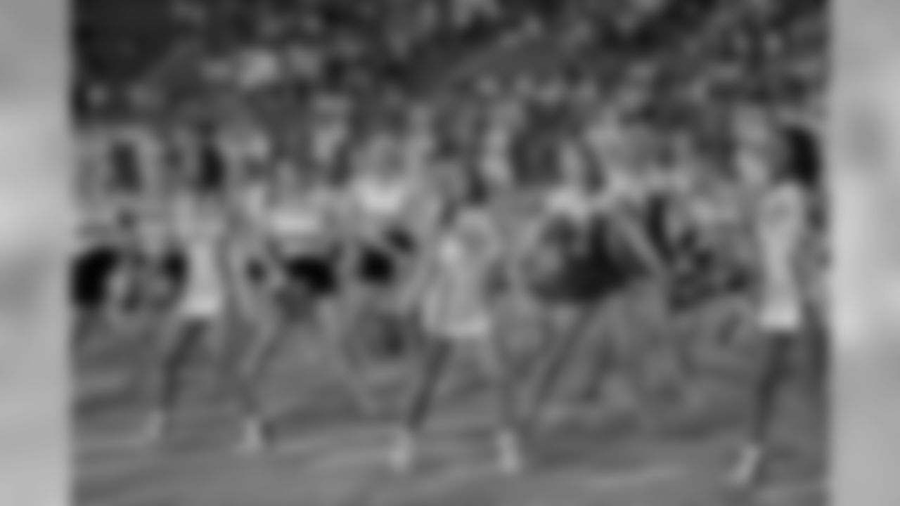 The Saintsations perform with the dance team from both schools at halftime during the NFL100 Fantennial game between Brother Martin and Jesuit at Tad Gormley Stadium on Friday, September 27, 2019. (Photo by Michael DeMocker)