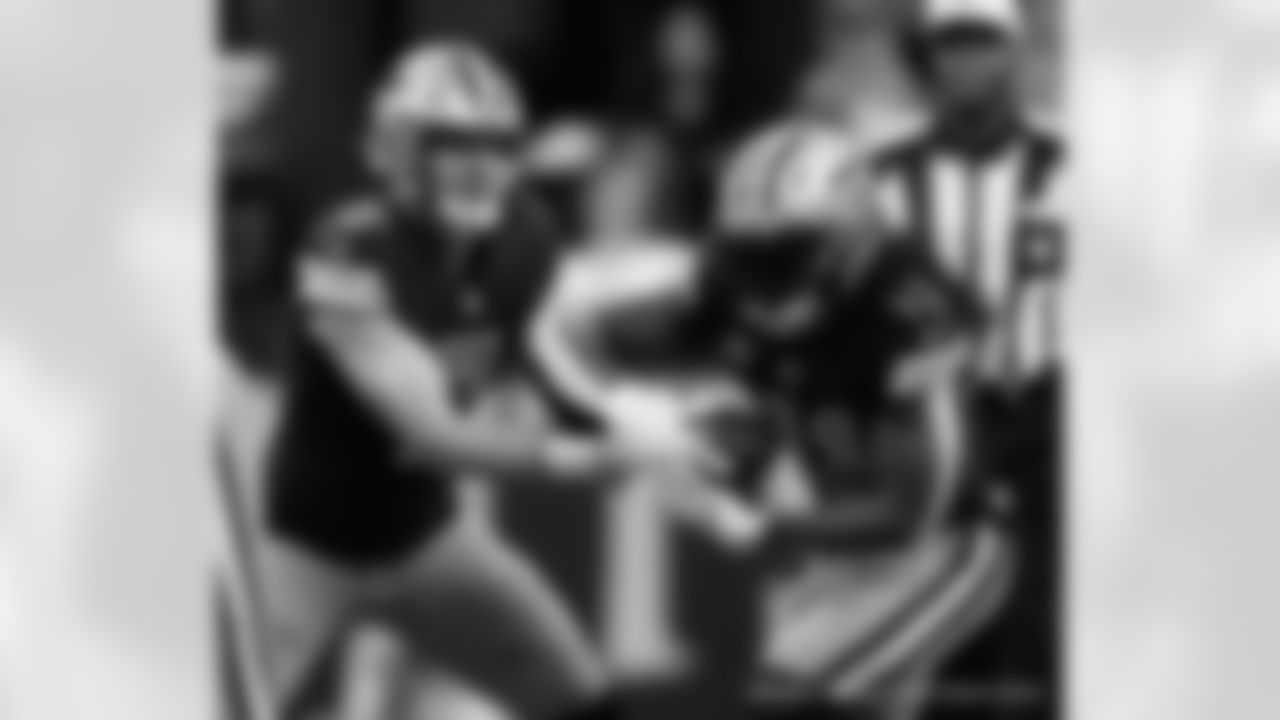 New Orleans Saints players in action during their 2022 Week 11 game against the Los Angeles Rams.