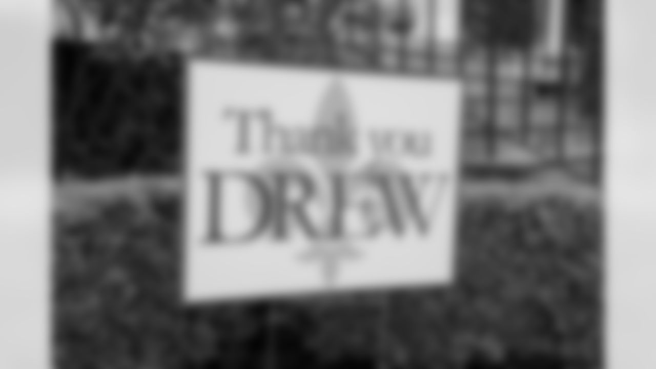 Following the announcement of Drew Brees' retirement from the NFL, New Orleans Saints fans and local businesses around the city paid tribute to legendary quarterback with yard decorations.