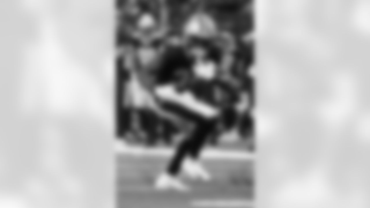 New Orleans Saints players in action during their 2022 Preseason Week 3 game against the Los Angeles Chargers.