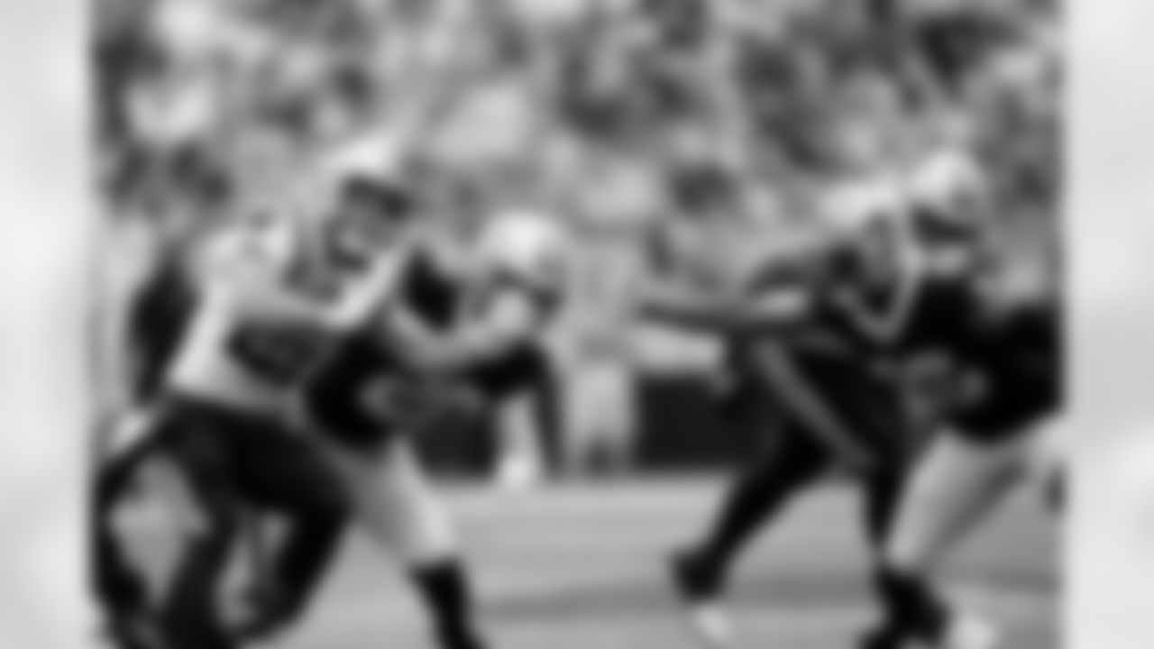 New Orleans Saints linebacker Pete Werner and defensive back P.J. Williams in action during their 2022 Week 3 game against the Carolina Panthers.