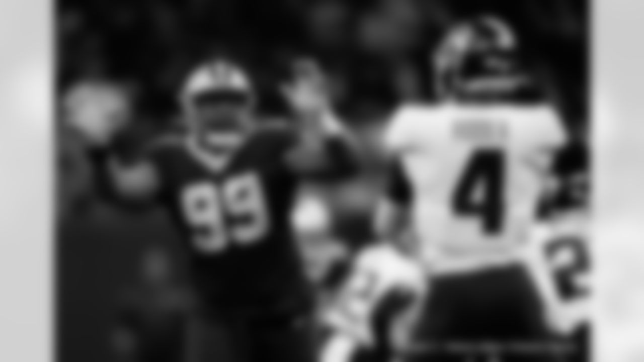 New Orleans Saints players in action during their 2022 Week 15 game against the Atlanta Falcons.