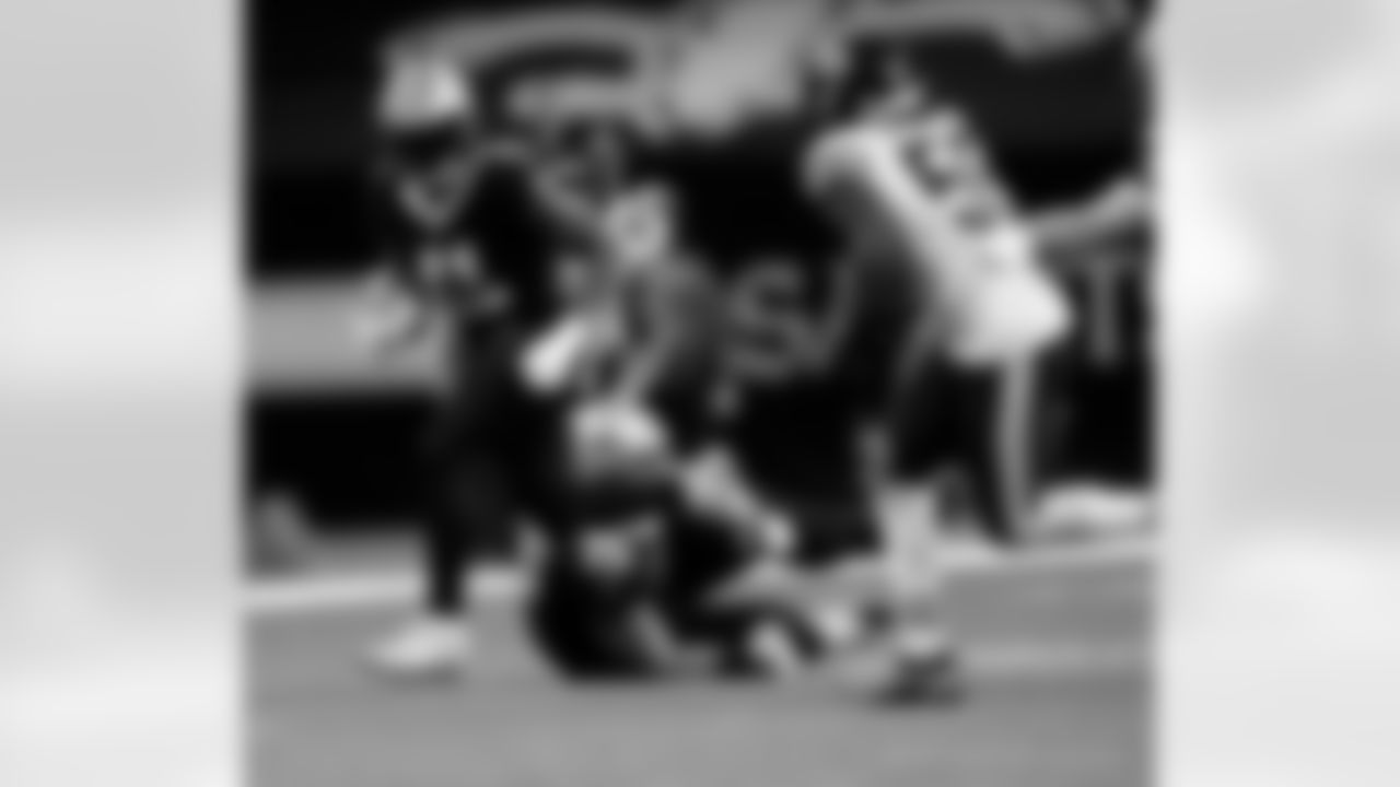 Game action photos from the New Orleans Saints vs. Chicago Bears matchup in the Wild Card round of the 2020 NFL playoffs.