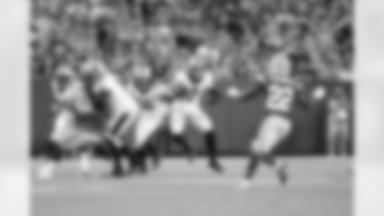 New Orleans Saints players in action during their 2022 Preseason Week 2 game against the Green Bay Packers.