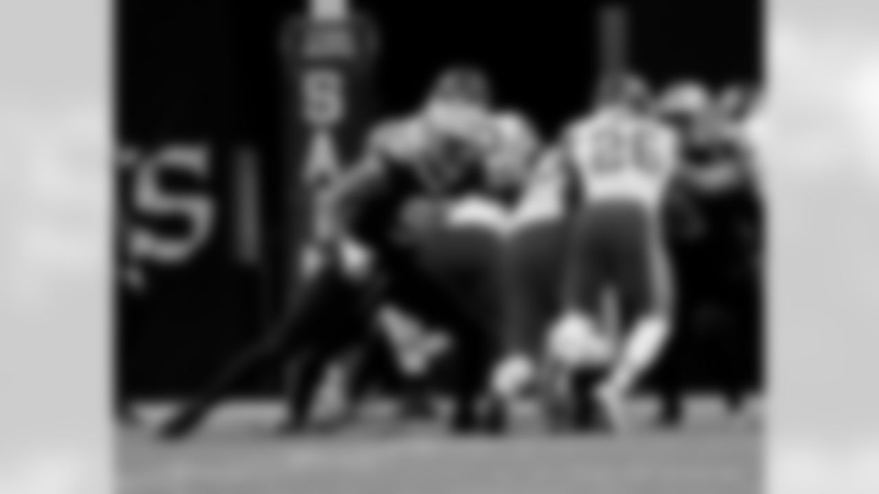Check out photos of New Orleans Saints defensive end Marcus Davenport in action during the 2020 NFL season.