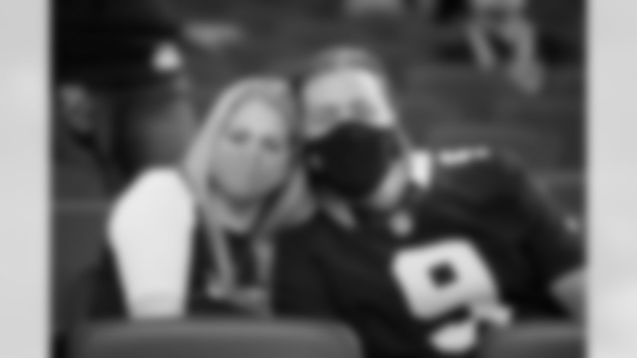 New Orleans Saints fans and cheer on the team from inside the Mercedes-Benz Superdome against the San Francisco 49ers in Week 10 of the 2020 NFL season.