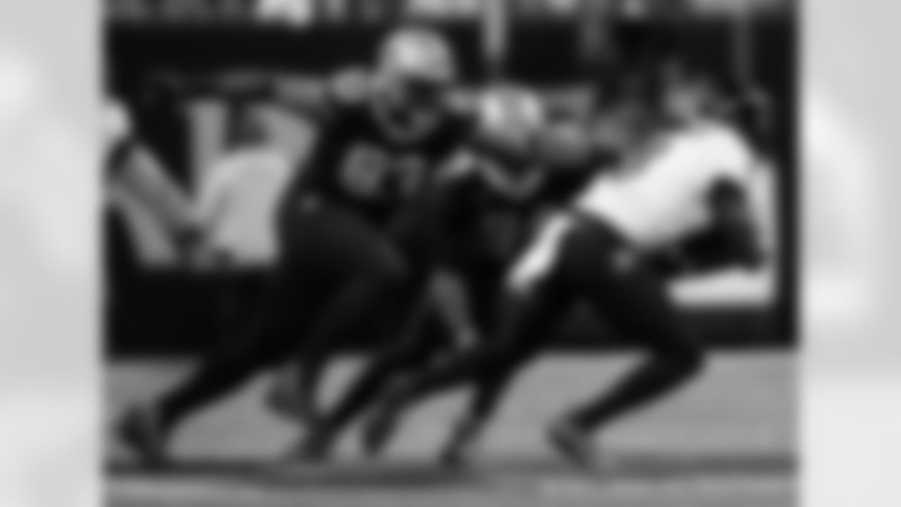 New Orleans Saints players in action during their 2022 Week 9 game against the Baltimore Ravens.
