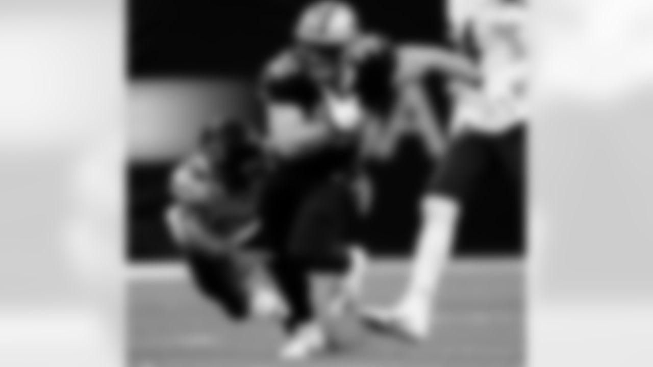 Game action photos from the New Orleans Saints vs. Chicago Bears matchup in the Wild Card round of the 2020 NFL playoffs.