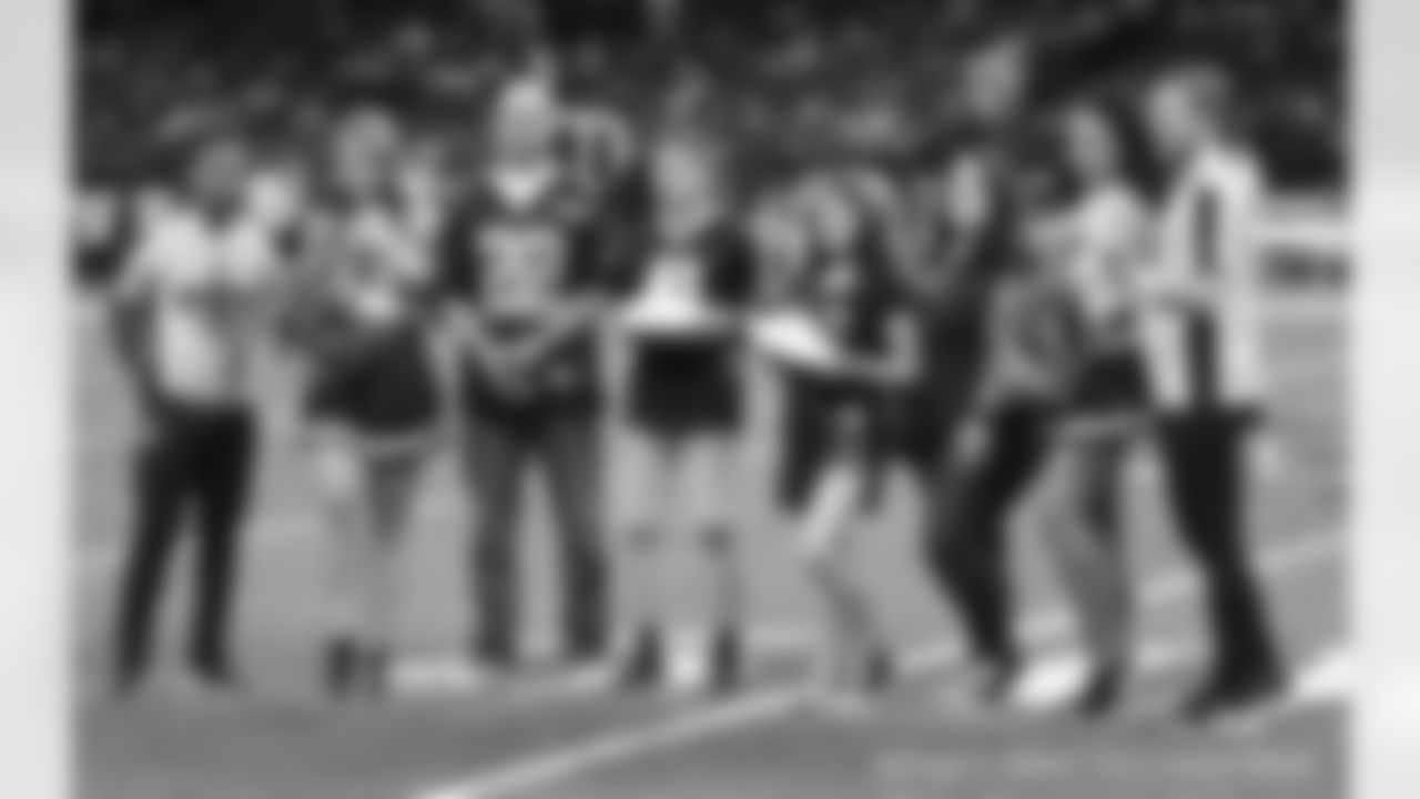 The New Orleans Saints Cheer Team and in-game performers entertain fans during the Thursday night Week 13 matchup against the Dallas Cowboys.