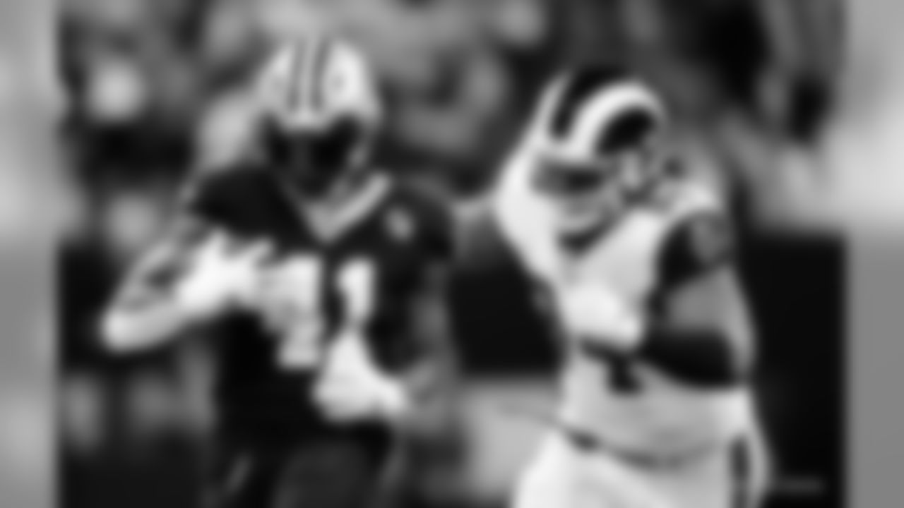 Rams 26 - Saints 23 (L) OT
NFC Championship Game

Michael C.  Hebert